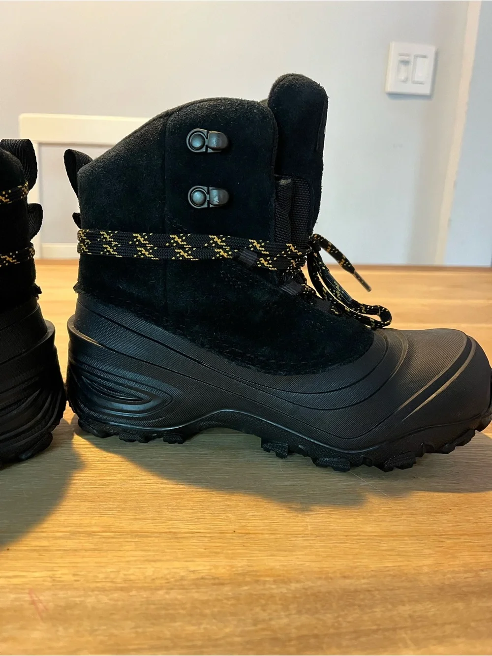 The North Face Black Boots with Yellow-Accent Laces